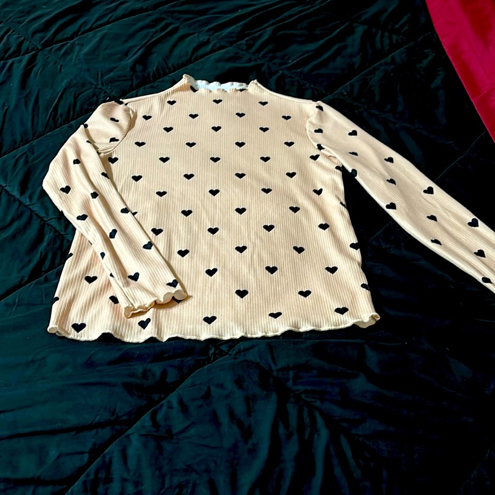 Beige shirt with black hearts, size medium